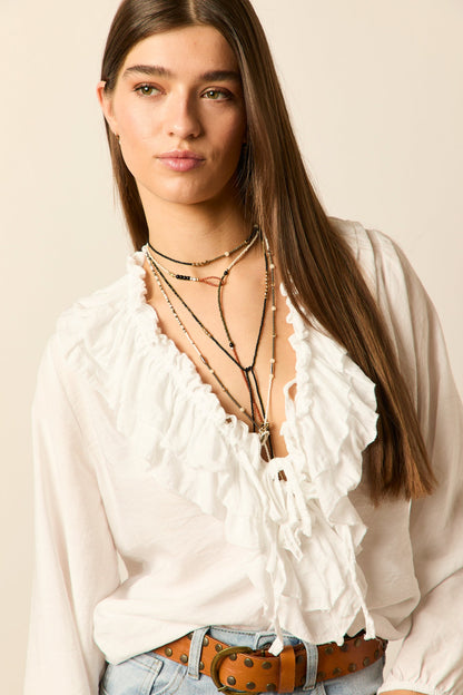 Blusa lazos blanca